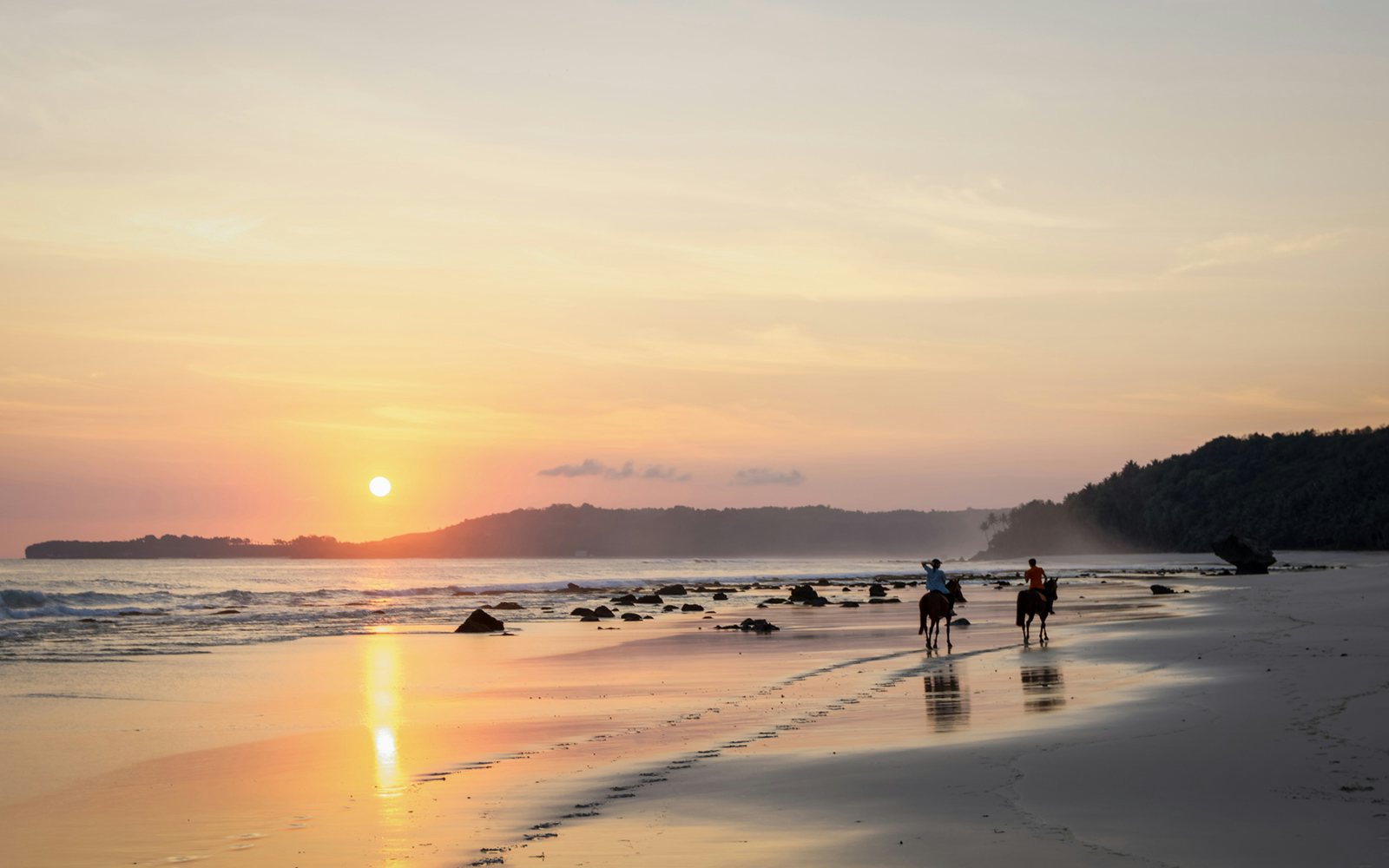 Horseback riding on the beach