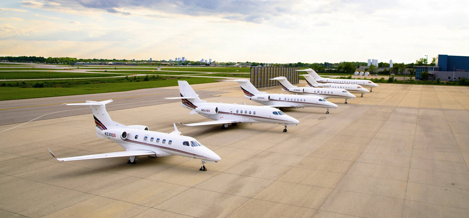NetJets aircrafts waiting at airport NetJets aircrafts waiting at airport