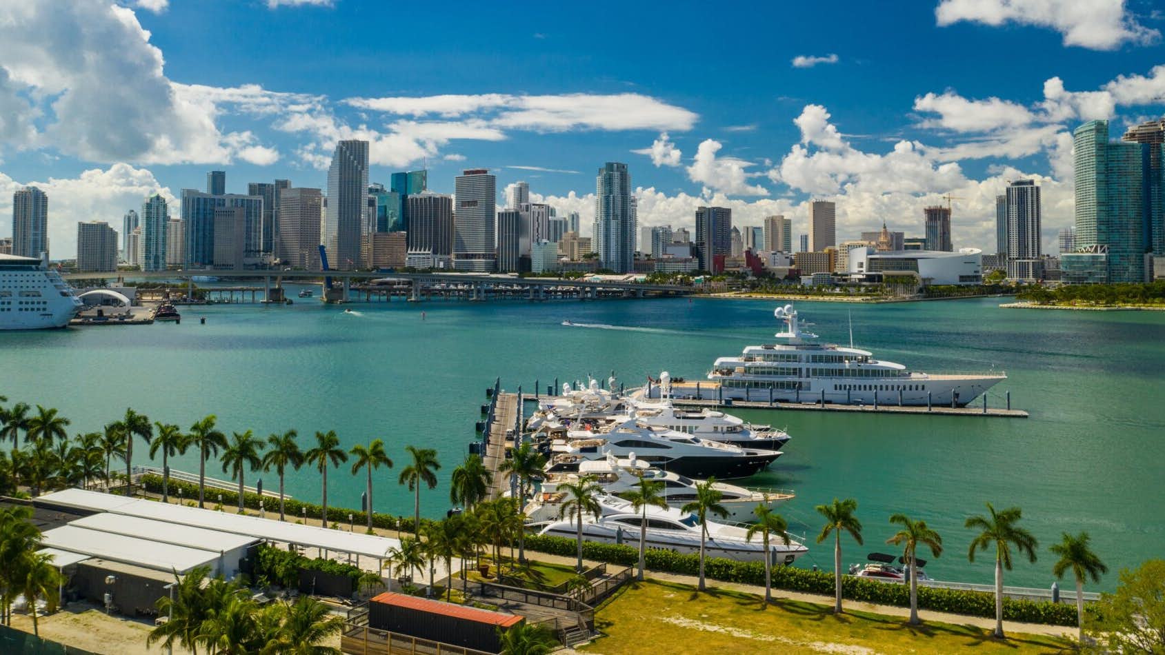A radiant day with sunshine illuminating Miami Port, the vibrant setting of the Miami International Boat Show.