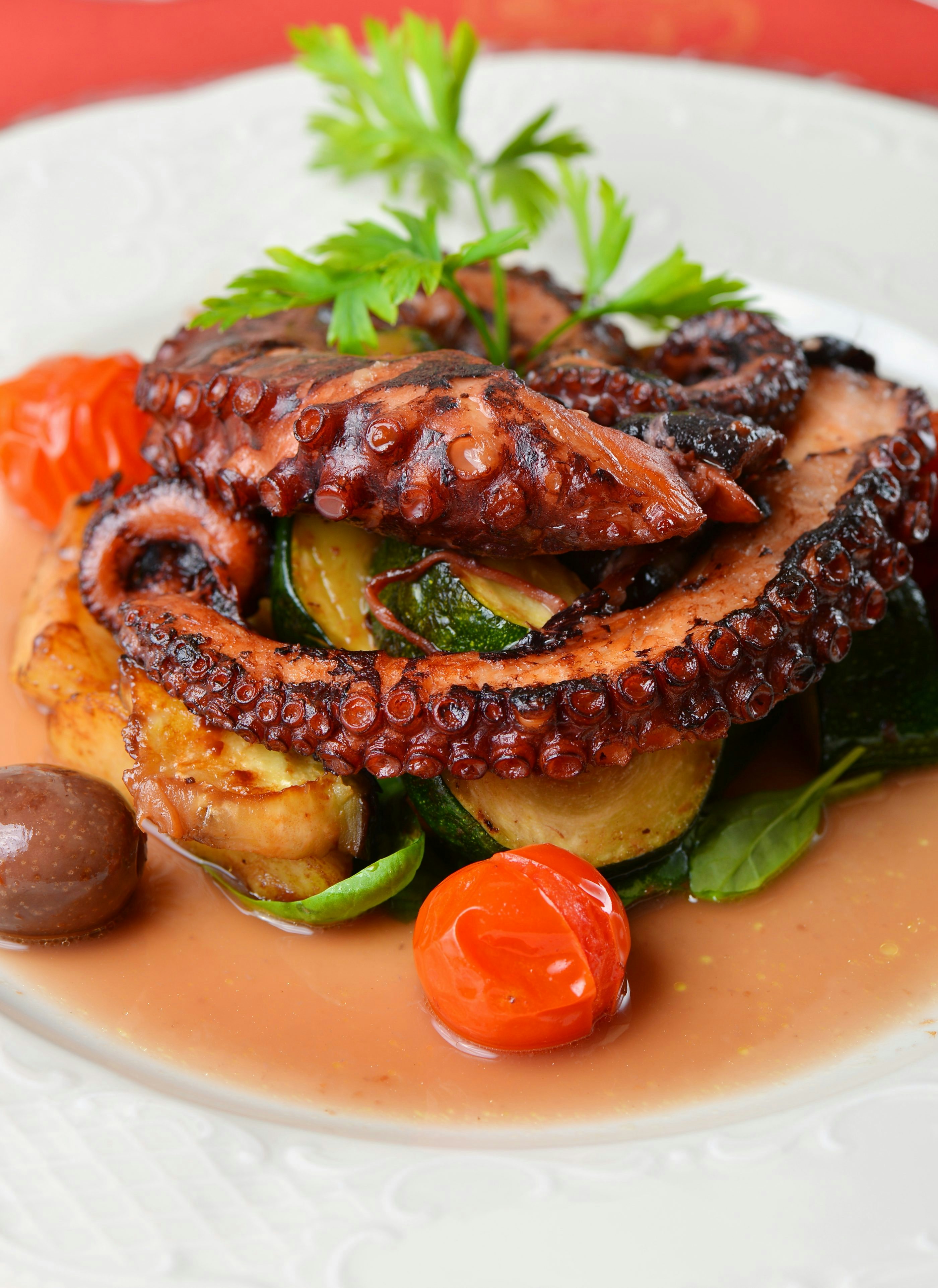 Fresh Grilled Octopus With Olives Potato Tomatoes Zucchini Vegetable