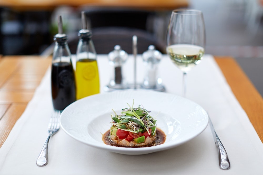 Sea,Bass,Ceviche,Is,A,Light,Snack,With,Cherry,Tomatoes,