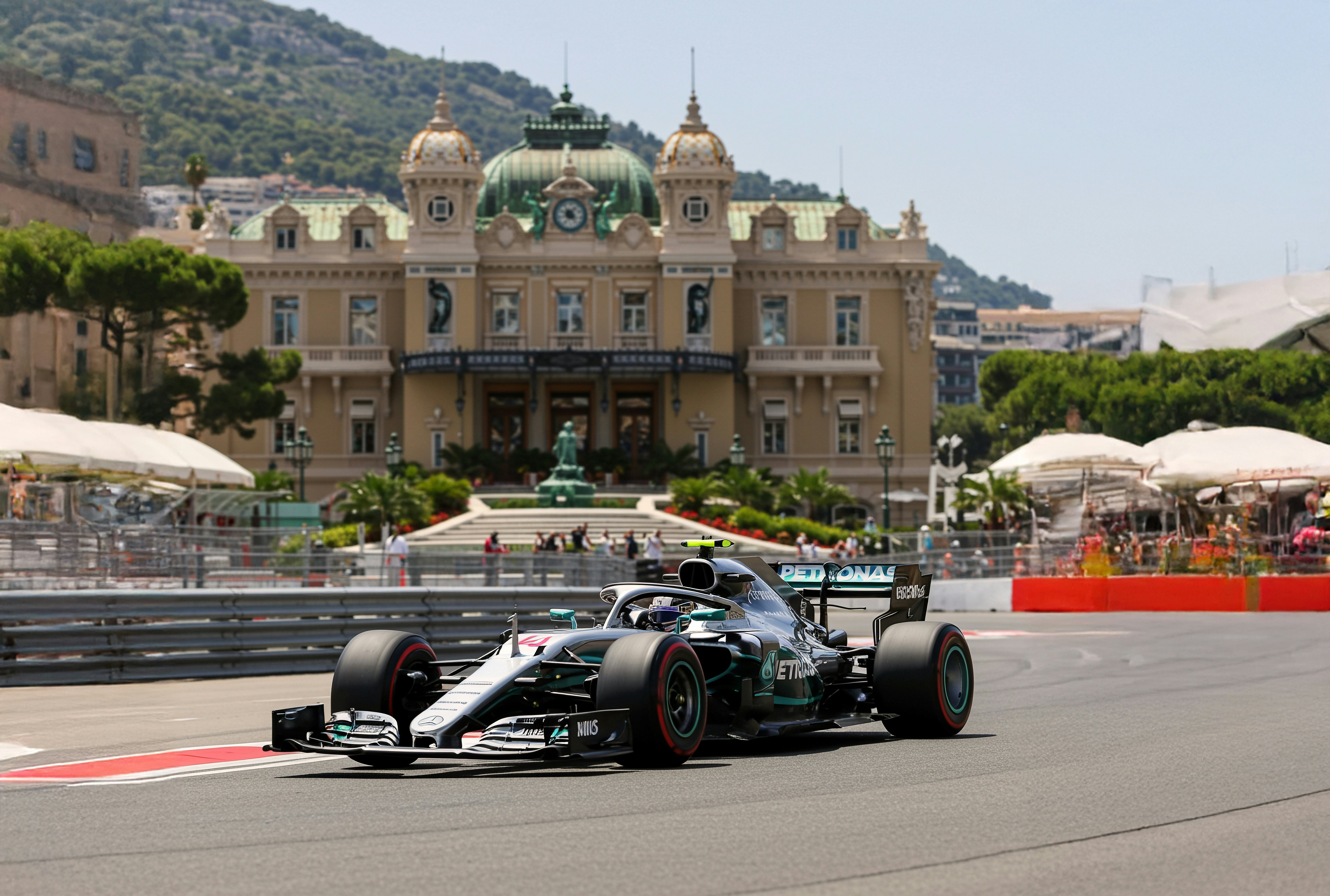 photo realistic image of silver modern formula 1 car racing on the streets of monaco with the montecarlo casino in the background