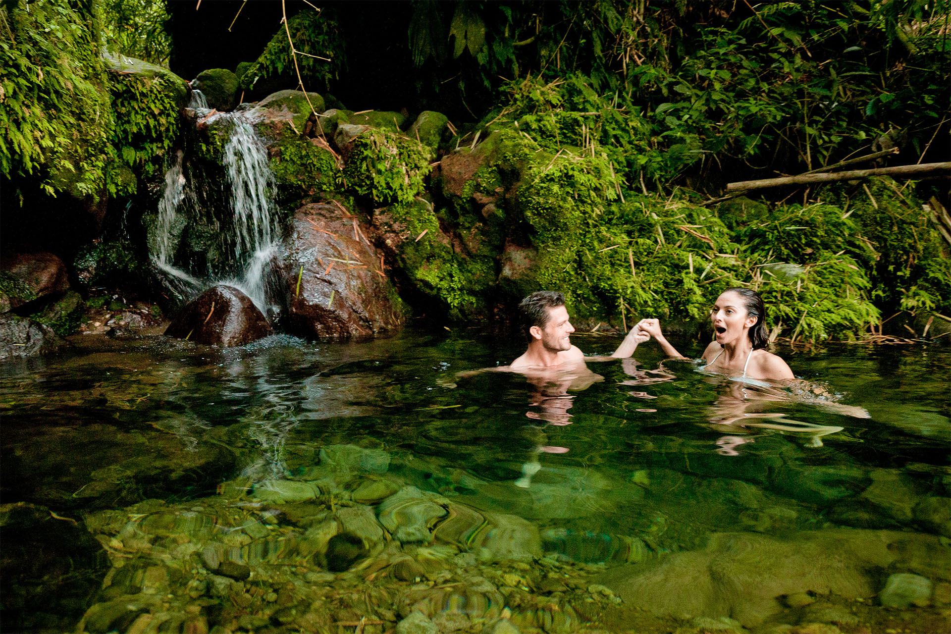 A river swim within St. Kitts lush rainforest