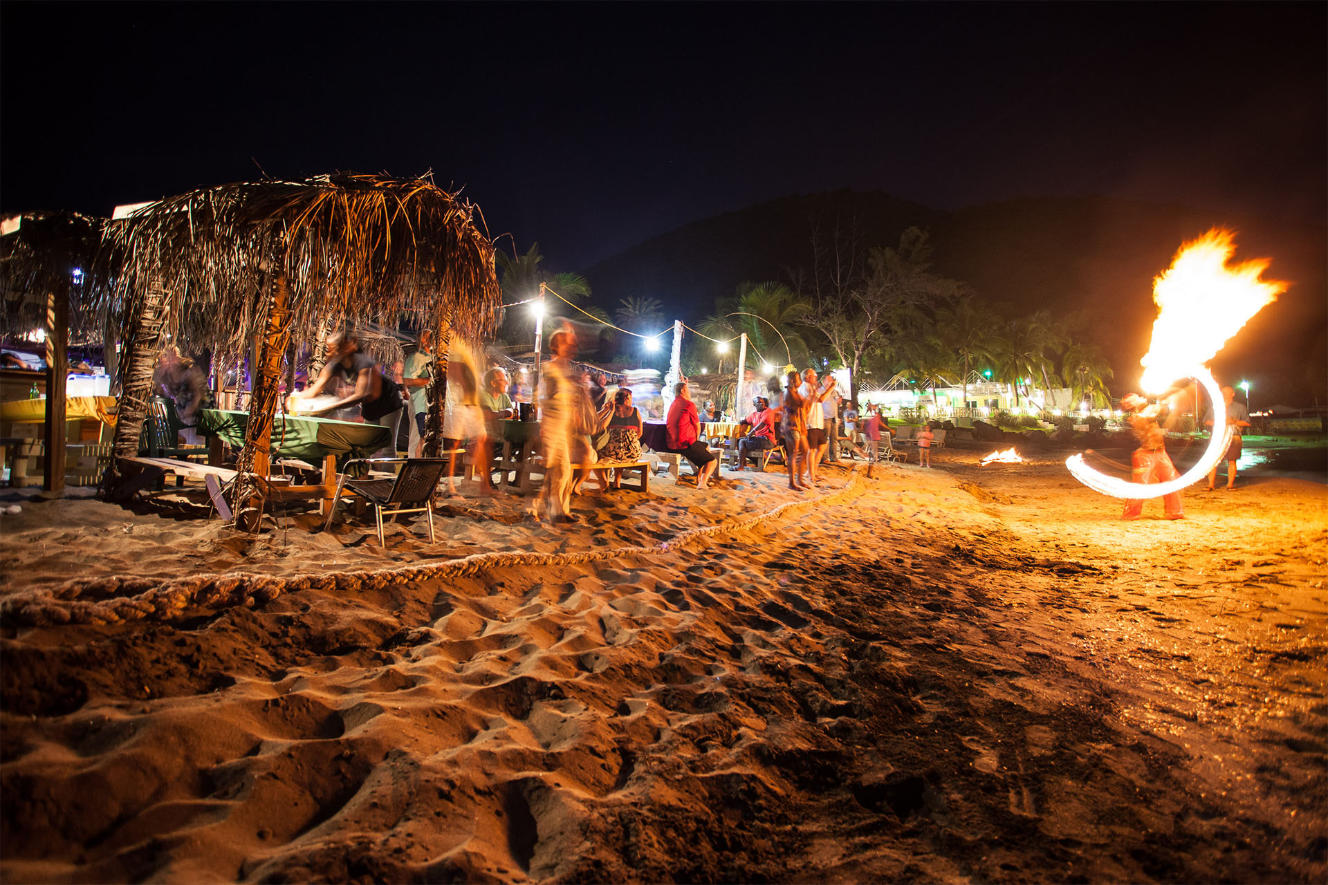 Dance the night away at a beach bar along The Strip in Frigate Bay
