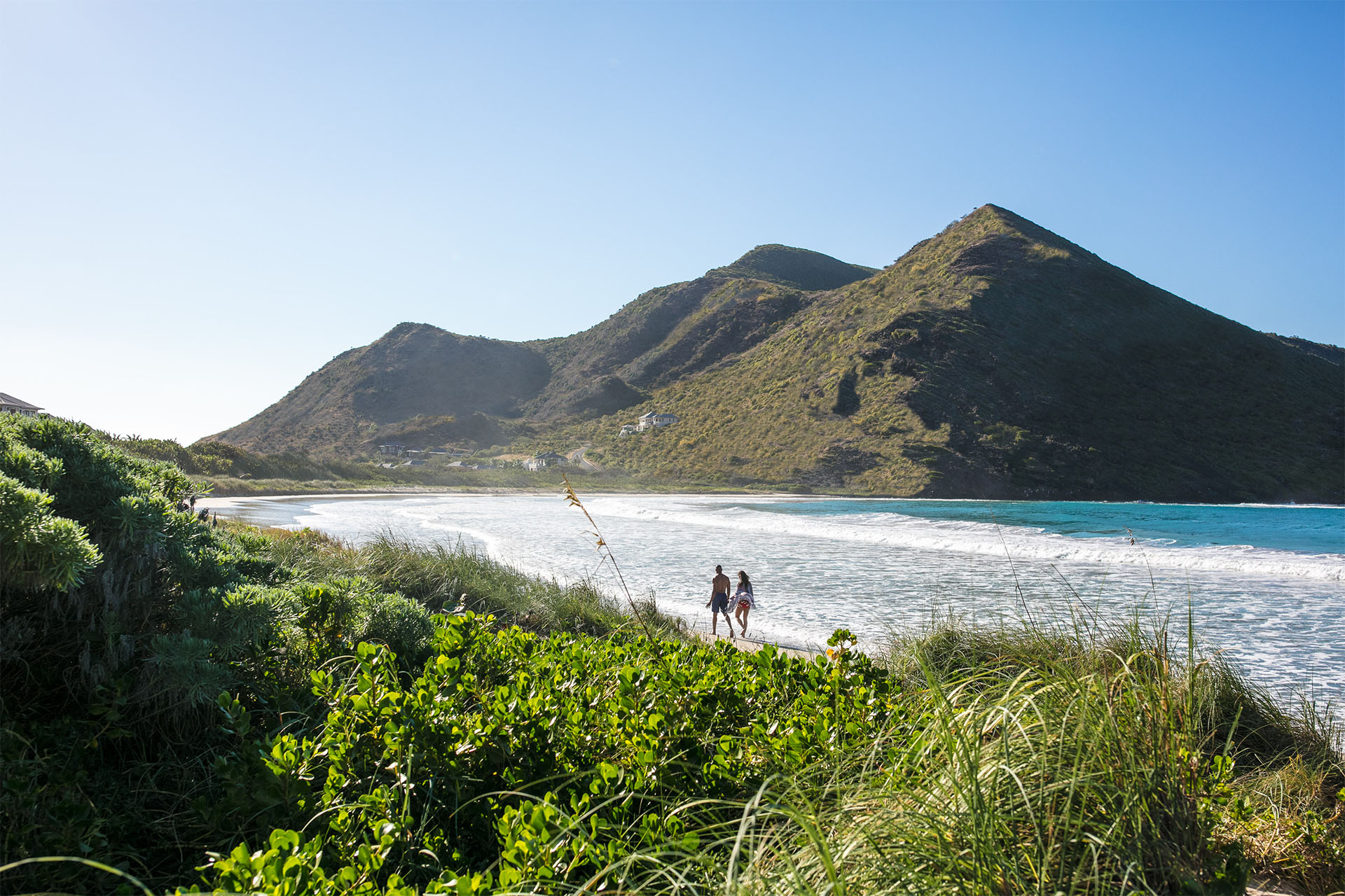 A blissful walk hand-in-hand along Sandy Bank Beach in St. Kitts